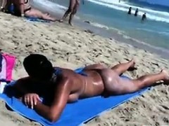 Beach Babe Getting A Tan